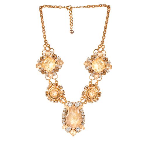five champagne coloured crystal necklace on a gold chain displayed in an ornate design. All five crystals are arranged in a different design