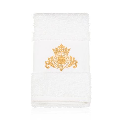 white cotton tea towel with Windsor Castle garter embroidered in gold threads