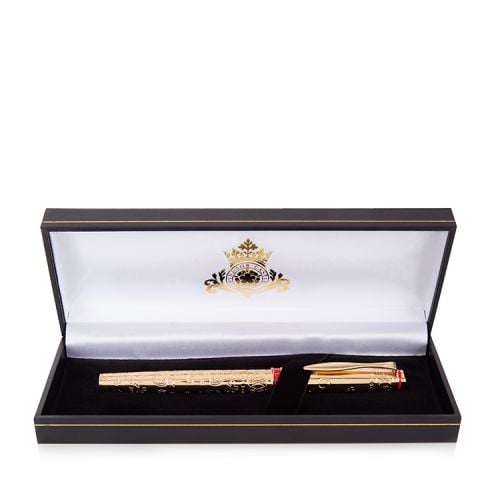 gold plated fountain pen with swirl design and printed with the words 'Windsor Castle'