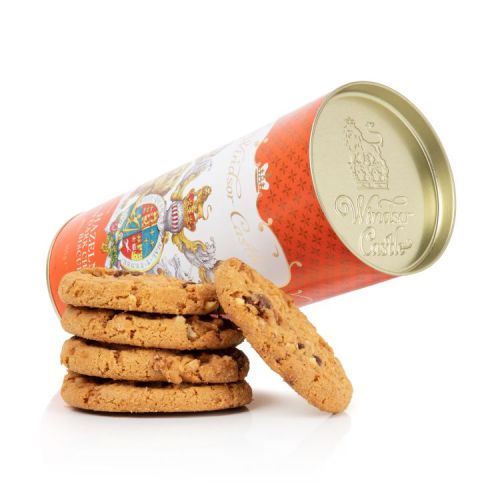 Orange cardboard tube of Hazelnut and dark chocolate biscuits. The lion and unicorn crest is at the centre of the design underneath the words 'Windsor Castle'