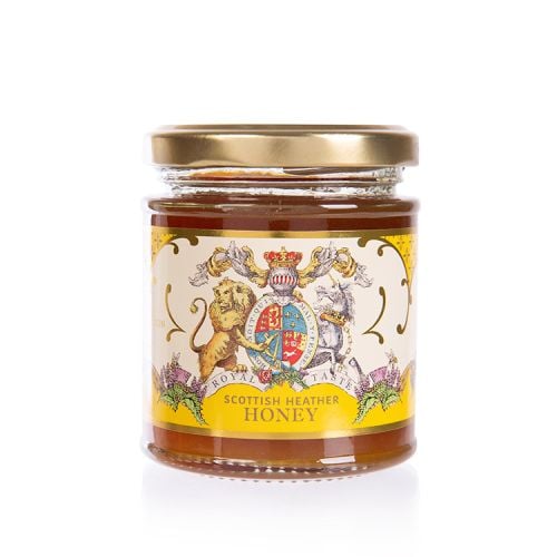 Glass jar of honey with yellow and cream label featuring the coat of arms