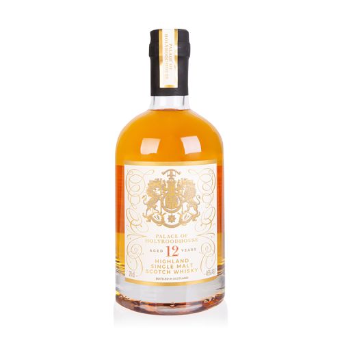 Bottle of whisky with a gold label showing the Scottish Coat of Arms