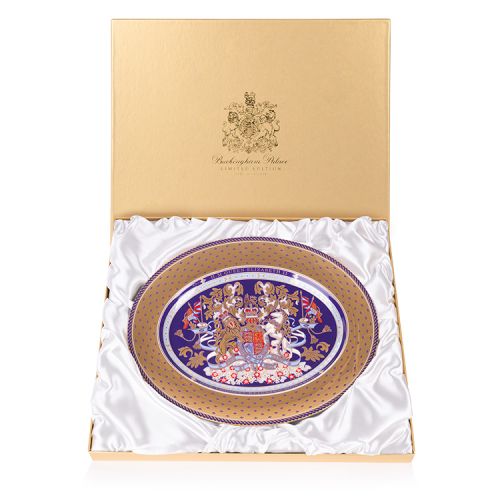 Oval charger plate with a detail gold and purple edge and an ornate purple, gold and light blue lion and unicorn crest at the centre. This is a Limited Edition piece of chinaware.