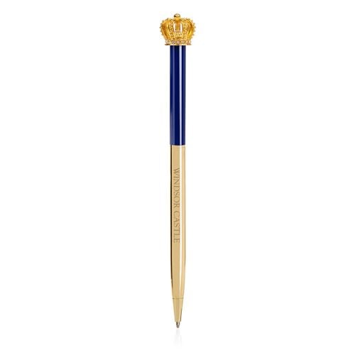 windsor castle pen. Topped with a gold coloured crown. The bottom half of the ballpoint pen is gold and the top half is blue