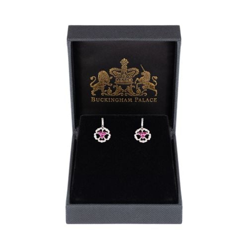 Drop earrings which form a beautiful wreath of roses, with diamonds making the exquisite petals and striking rubies are at the centre of the flowers.