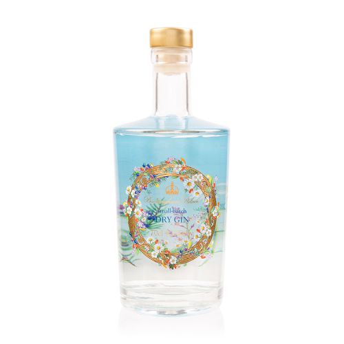 70 cl bottle of dry gin. A clear glass bottle with a gold circular design on the front surrounded by various botanicals including hawthorn berries, lemon verbena and mulberry leaves that have been used to make this gin