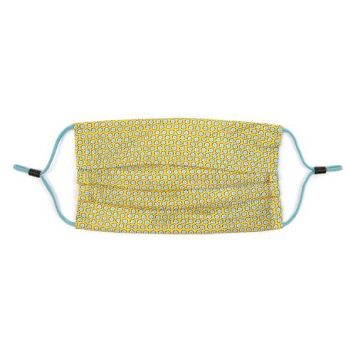 yellow printed face covering with adjustable straps