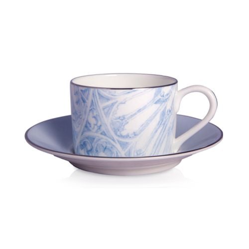 blue and white teacup and saucer