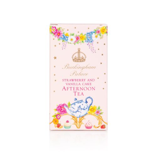 Pink box decorated with gold stars, and floral garlands. At the bottom of the box is a design of florals, a floral teapot and cakes. At the centre of the box is a gold coronet the words Buckingham Palace in gold and 'strawberry and vanilla cake afternoon 