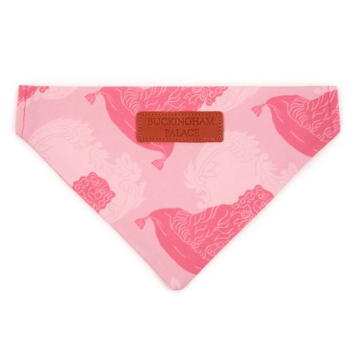 Pink bandana with pink dog pattern layered over pale pink floral pattern.