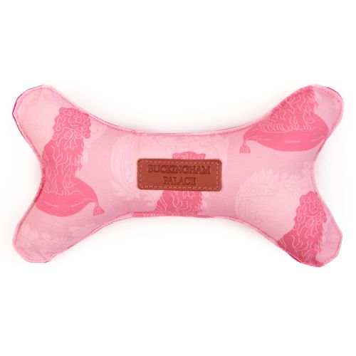 Bone shaped dog toy made with pink dog printed material and a leather 