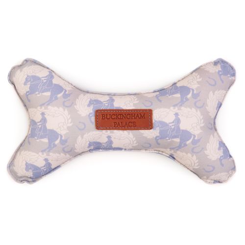 Bone shaped dog toy made using grey material and printed with light blue horses. With a leather Buckingham Palace tag