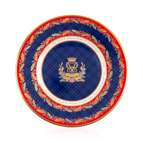 Limited Edition plate to commemorate the life of The Duke of Edinburgh. With a red border and gold leaves, the centre of the plate is a blue design with Prince Philip's cipher at the centre