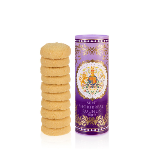 Purple tube of biscuits featuring the coat of arms. Next to the tube is a pile of shortbread biscuits