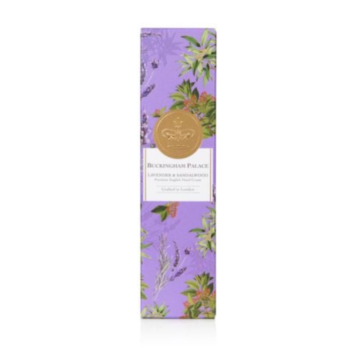 Silver tube of hand cream decorated with lilac florals. A silver crown is printed on the front.