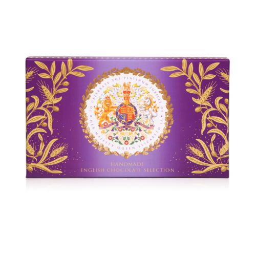 Purple open box of chocolates. On the lid a coat of arms features. The box contains plain and dark chocolates.