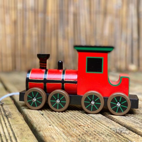 Red pull along train with string