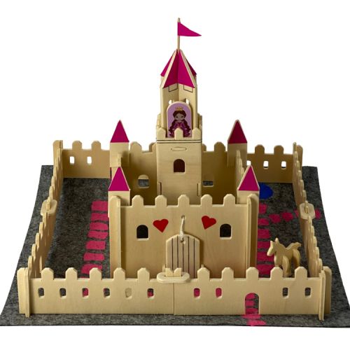 A rectangular tin displaying a make a magical princess castle kit