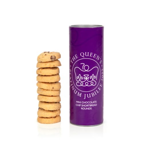 Purple miniature biscuit tube featuring the Platinum Jubilee emblem logo. Next to the tube is a tower of chocolate chip biscuits.