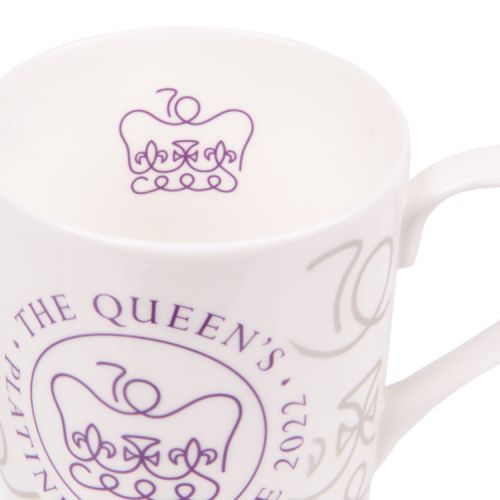 White coffee mug featuring The Queen's Jubilee 2022 emblem in purple