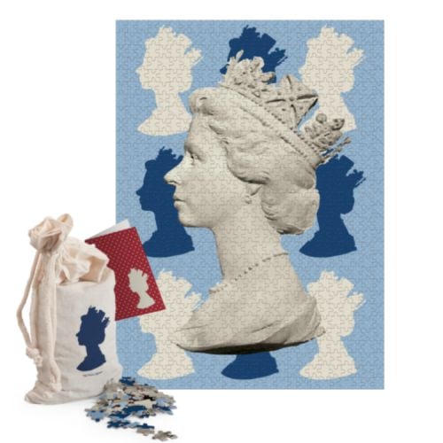 Blue jigsaw of the Machin design featuring the silhouette of The Queen. Next to the complete jigsaw is a cotton drawstring back to carry.