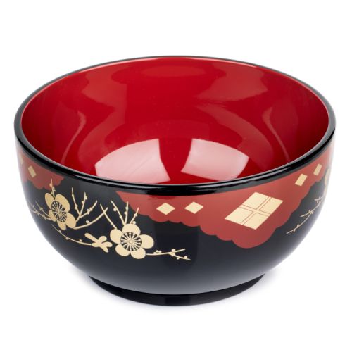 Noodle bowl with red inside and black outer design featuring a Japanese floral pattern