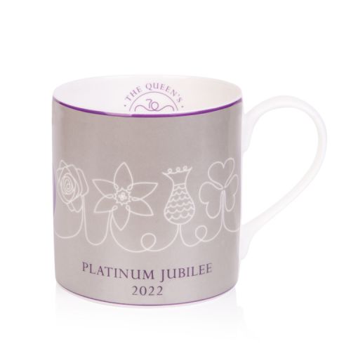 Silver coffee mug with a white floral design and the words 'Platinum Jubilee 2022' printed at the base