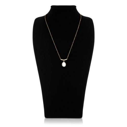Gold chain with seven small crystals and pearl drop