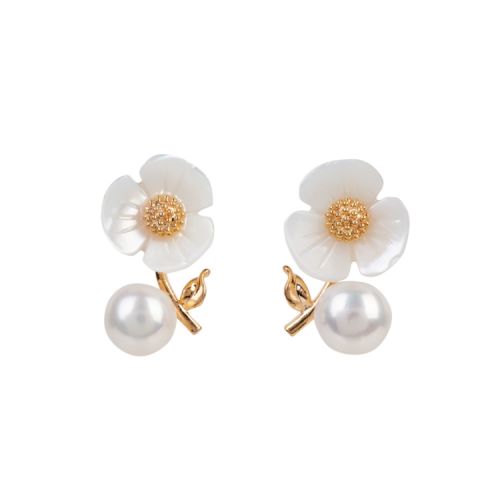 White flower earrings with pearl attached to gold stem.