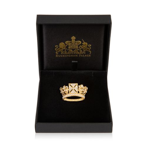 Gold crown shaped brooch with crystal and costume pearls.