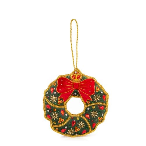 Wreath decoration with red bow and sewn crystals. Gold embroidery.