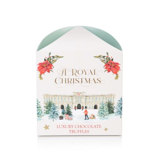 square packaging of truffles including buckingham palace on the front and gaurdsman pulling a dog on sleigh