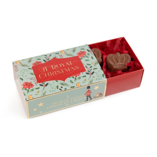 small box of three chocolate coins inside with a royal christmas written on the packaging and gold foil stars to decorate 