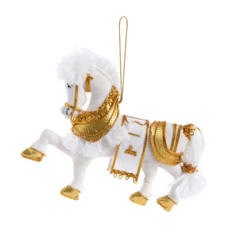 White horse decoration with gold accents.