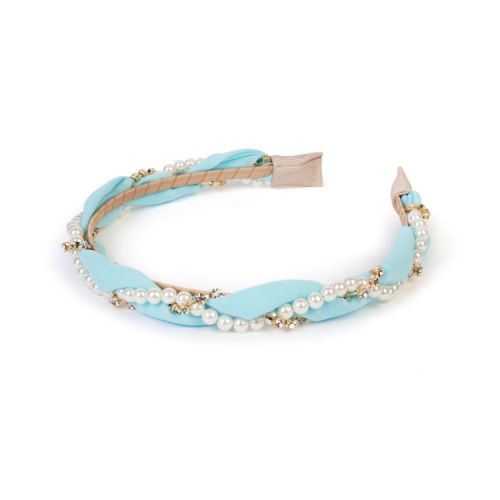 Light blue fabric wrapped with costume pearls and crystals. 