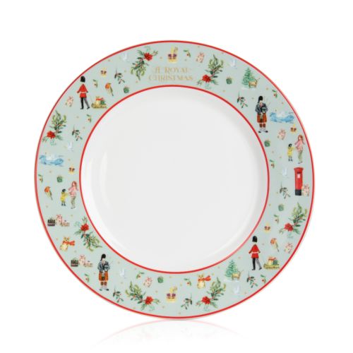 plate with decorative border of royal decorations and flowers with a mint green background and red trim
