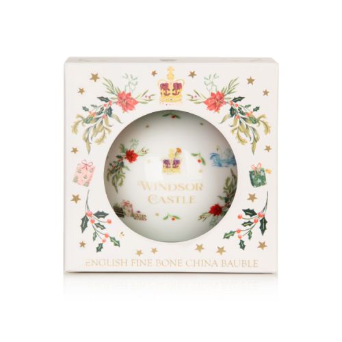 White china bauble decorated with an illustration of Windsor Castle in the snow and assorted Royal illustrations.