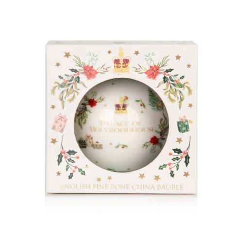 White china bauble decorated with an illustration of the Palace of Holyroodhouse in the snow and assorted Royal illustrations.