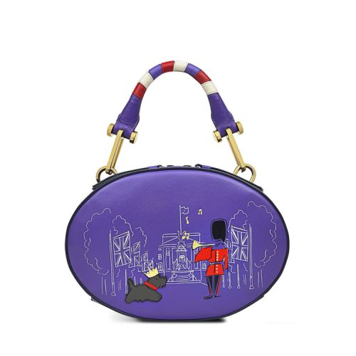 Front of bag. Purple oval with sketch of Buckingham Palace, applique Guardsman and Radley Scottie dog. Handles have red and white stripes.