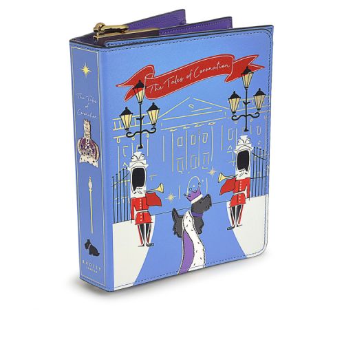 Radley book bag with crown and specter on the spine. Front of bag features a sketch of Buckingham Palace, guardsmen and the Radley Scottie dog wearing Coronation robes. 