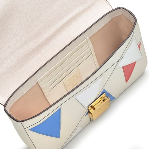 Front of bag. Cream with bunting applique in red, white and blue. Blue contrast handle.