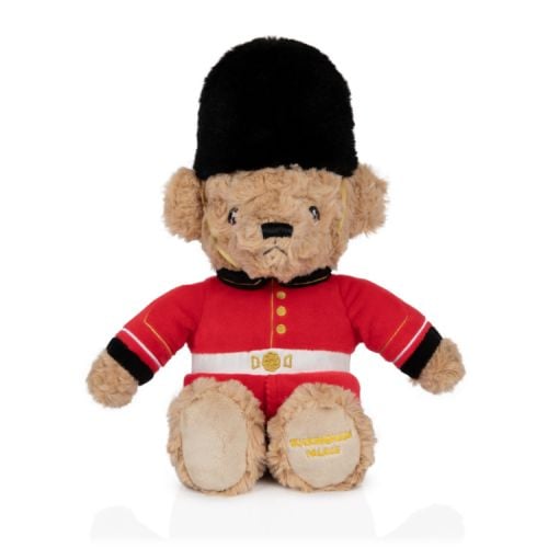 Teddy Bear wearing traditional Guardsman uniform. Buckingham Palace is embroidered in gold thread on the foot.