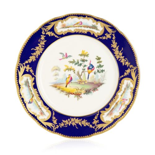 Prestige plate with hand painted birds, finished with gold plating. 