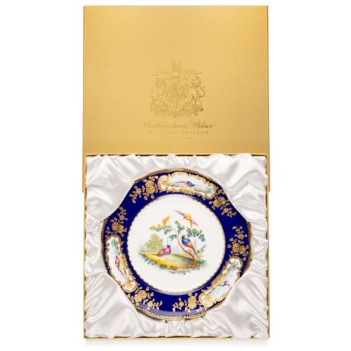 Prestige plate with hand painted birds, finished with gold plating. 