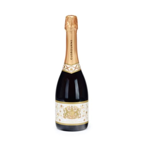Gusbourne English Sprakling wine. Royal coat of arms in gold on white label.