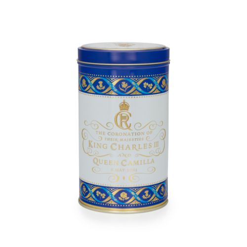 Tea caddy with blue lid and the Royal coat of arms at the centre.