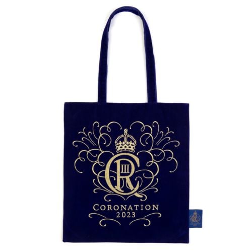 Dark blue velvet bag with gold decoration of King Charles III Cypher.