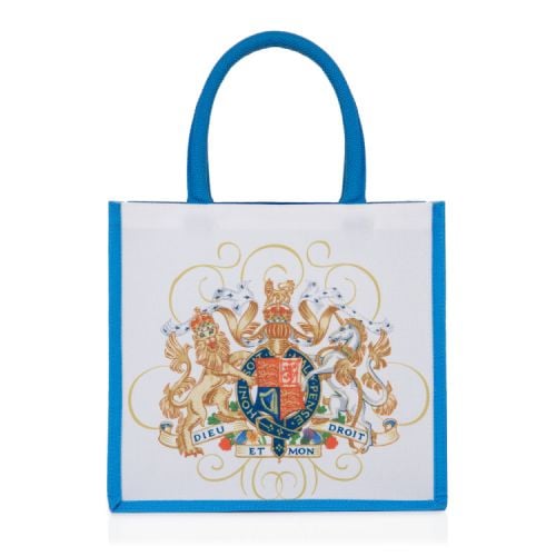 White bag with blue handles and sides. Coat of arms at the centre. 