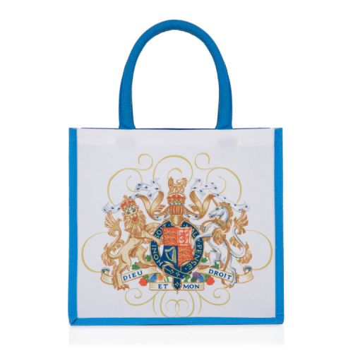 White bag with blue handles and sides. Coat of arms at the centre. 