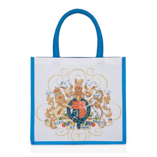 White bag with blue handles and sides. Coat of arms at the centre. 